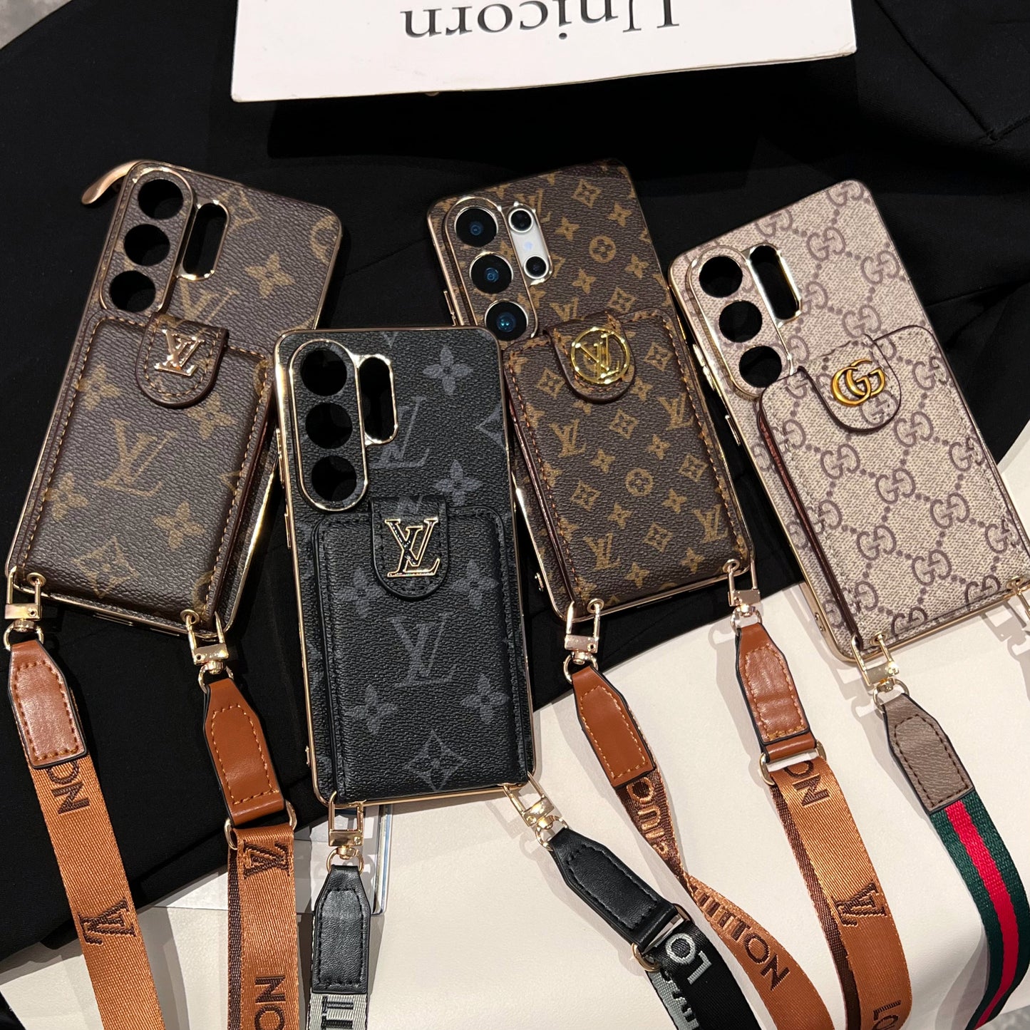 Funda para teléfono tipo bandolera con monograma de lujo, bolsillo para tarjetas y correa para el hombro