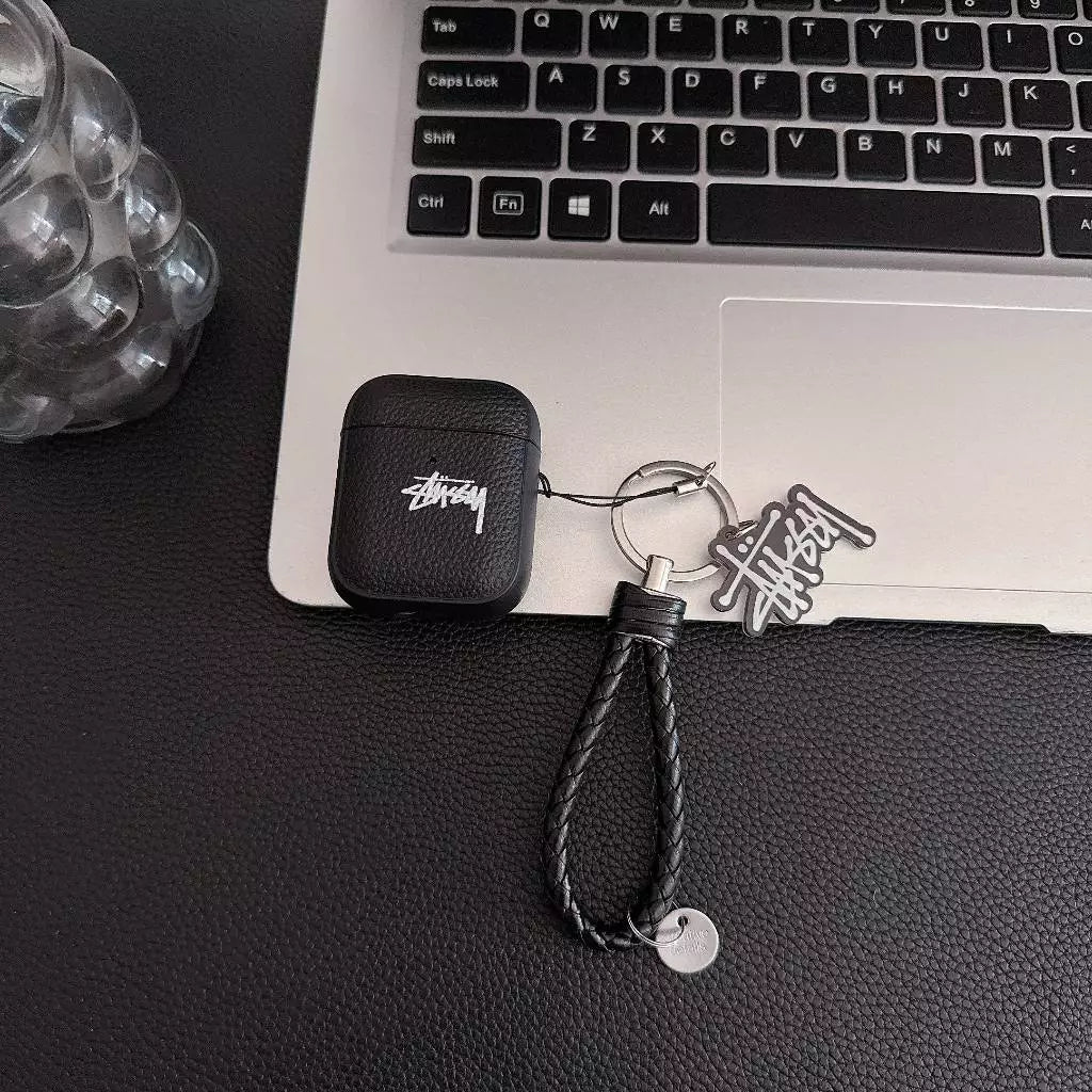 Lichee Grain Logo AirPod-etui med fletningsstrop