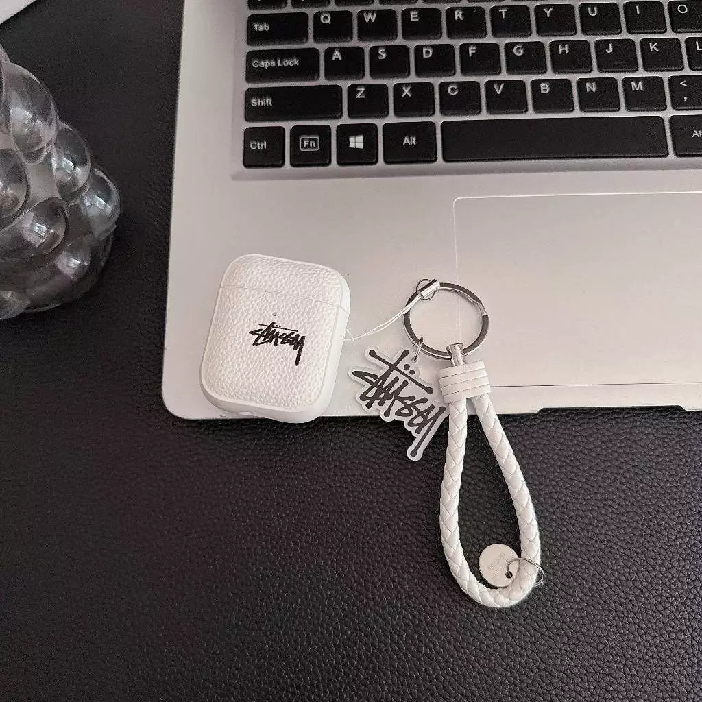 Lichee Grain Logo AirPod-etui med fletningsstrop